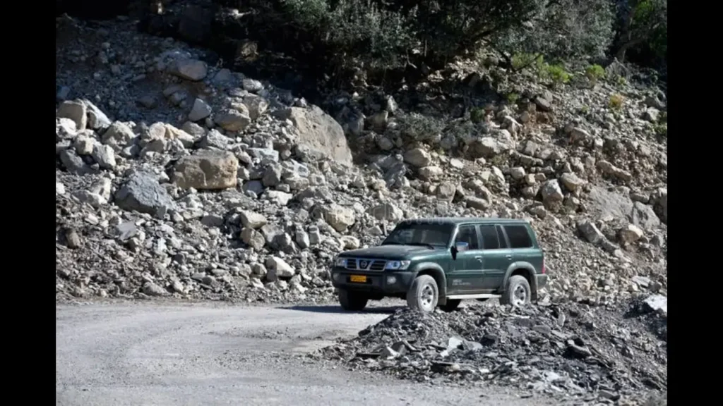 nissan-car-driving-mountain-road